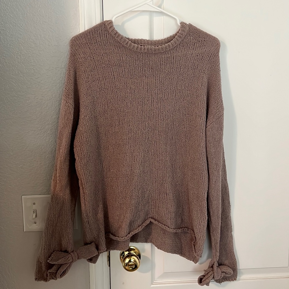 Tie sleeve sweater.